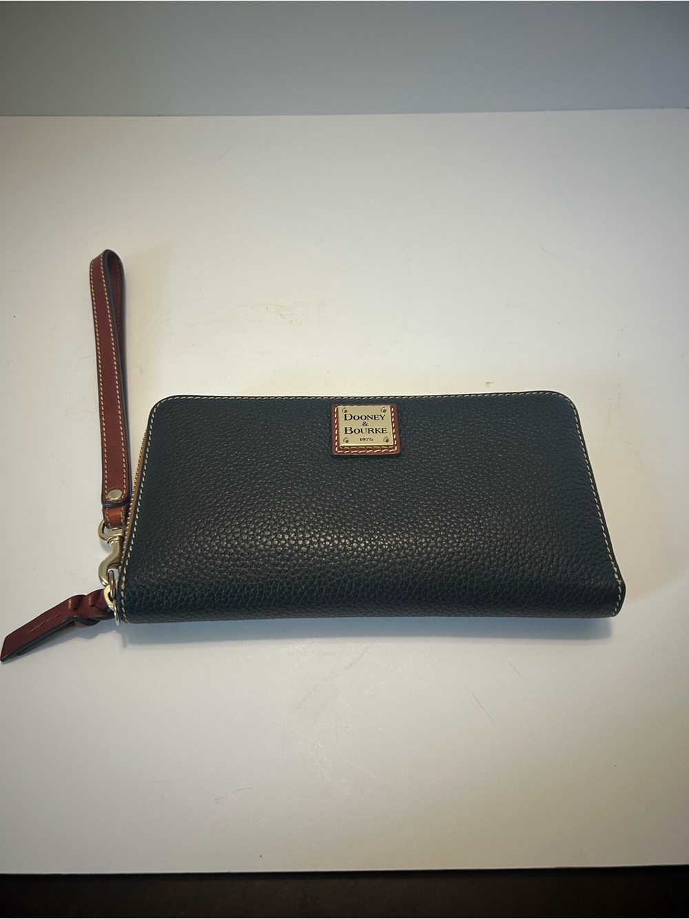 Dooney & Bourke Black Pebbled Leather Zip Wristlet with Brown Strap